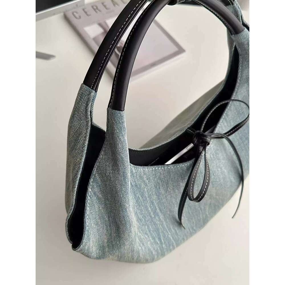 New niche design versatile canvas for women 2025 Korean splicing fashion handbag armpit tote bag