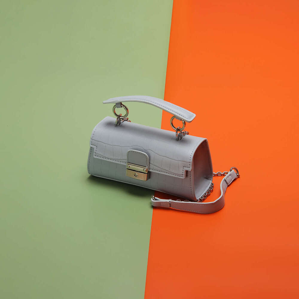 designer Women's bag Women's with high-end and niche design, hand-held small bag, 3 new single shoulder diagonal cross bag