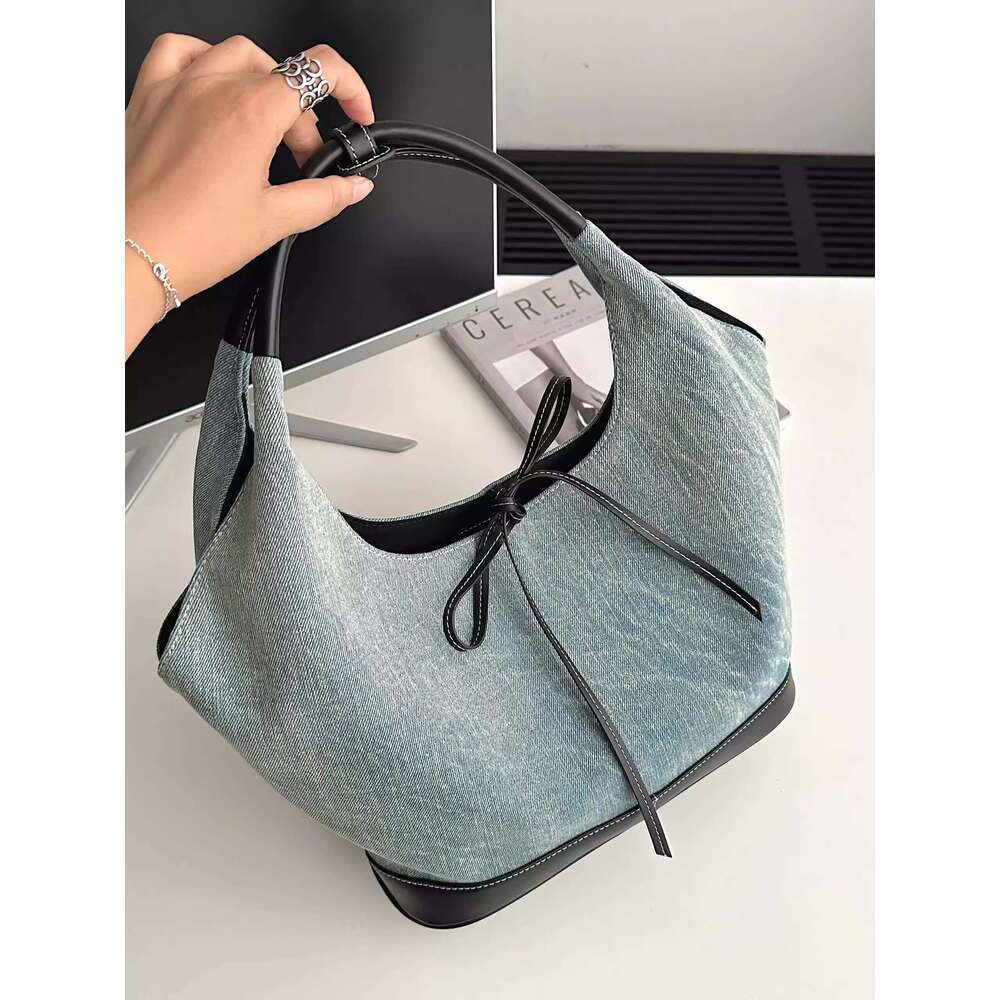 New niche design versatile canvas for women 2025 Korean splicing fashion handbag armpit tote bag