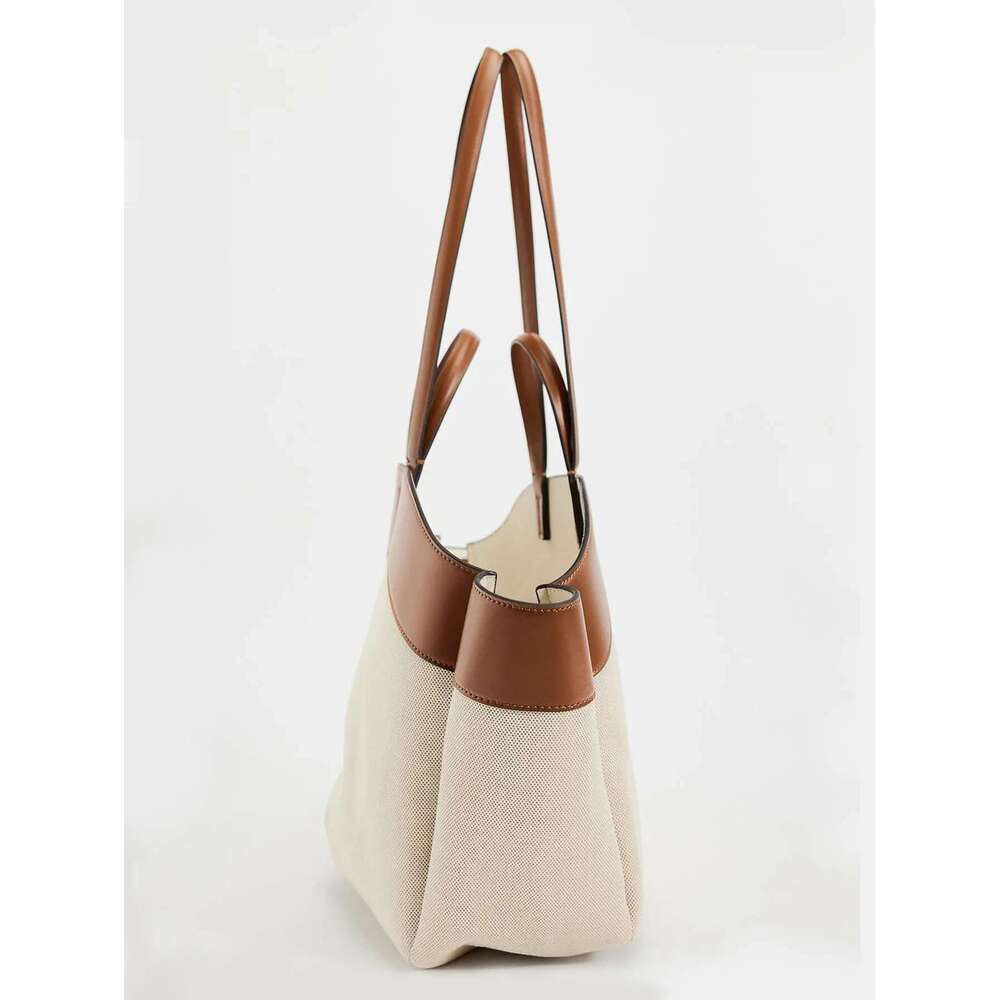 Canvas bag for women 2024 new product, fashionable splicing, large capacity commuting shopping bag, hand-held single shoulder to
