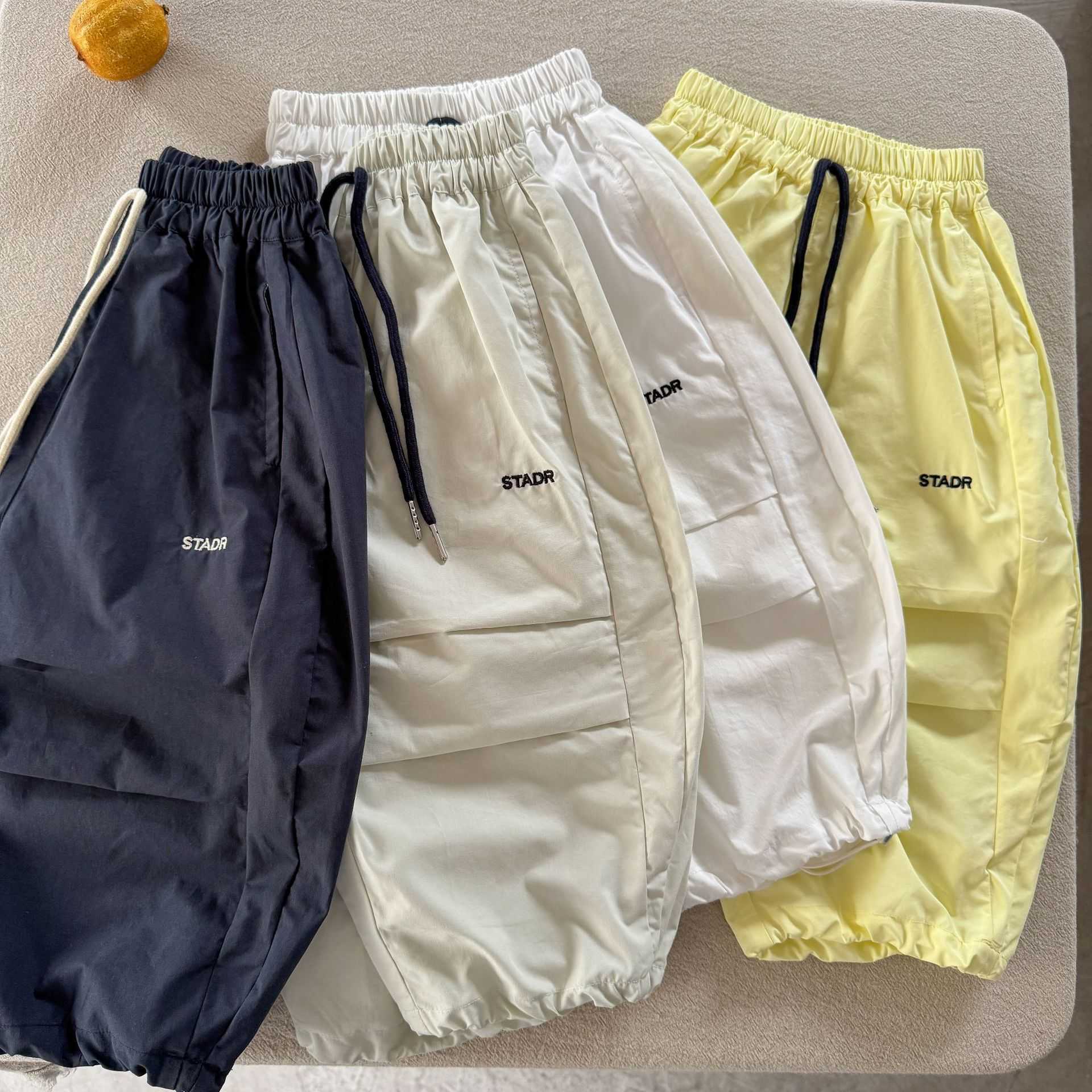 2025 Summer New Boys and Girls Four Color Embroidered Parachute Pants Personalized Baby Casual Pants Trendy Y250430HBUI