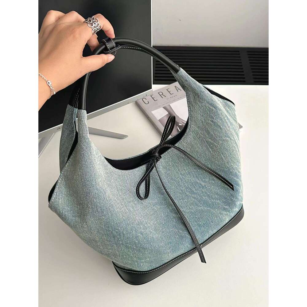 New niche design versatile canvas for women 2025 Korean splicing fashion handbag armpit tote bag