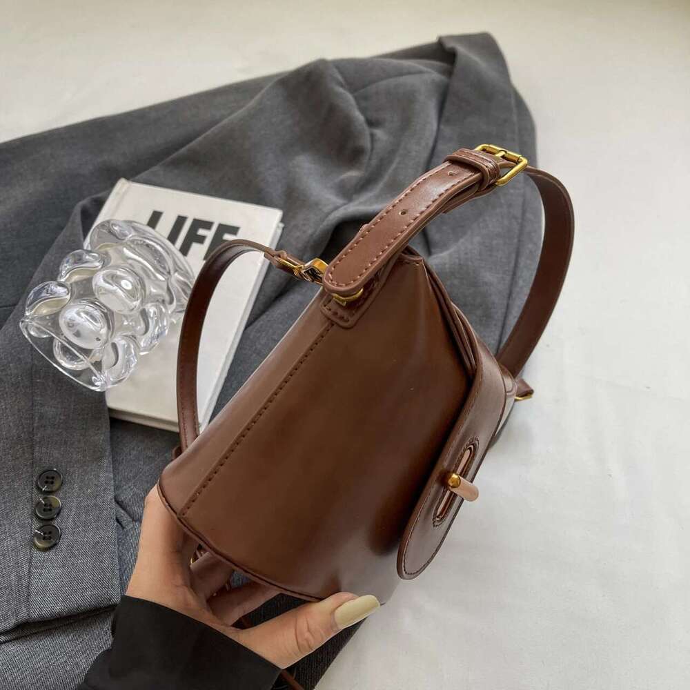 High Fashion Hand-Held Oblique Straddle Retro Pure Color Niche Design Bucket Shoulder Bag