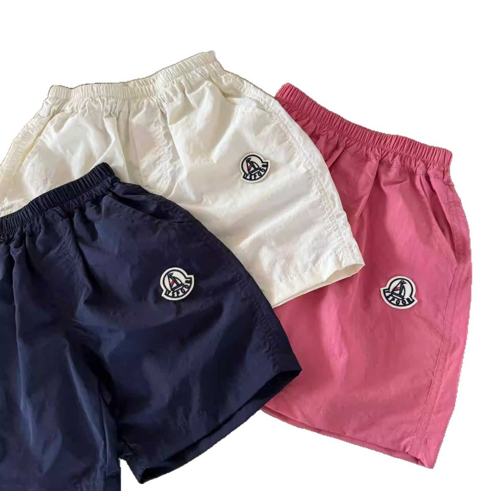 Childrens Shorts Mens Outerwear for Summer 2025 Korean Style Medium and Small Childrens Solid Color Shorts Breathable Baby Five Quarter Pants Womens t