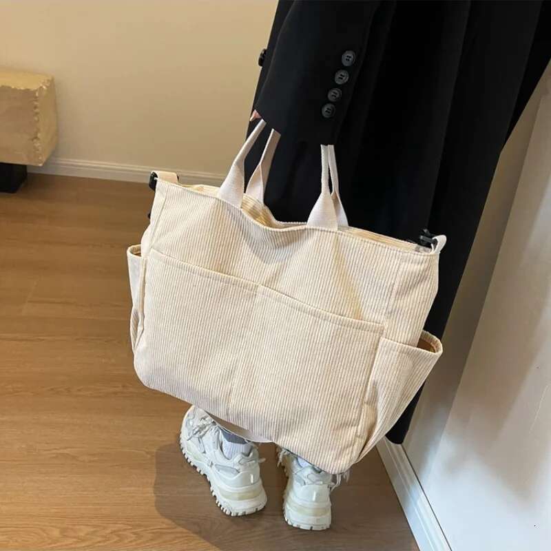 Simple Color Multi Pocket Corduroy Tote Bag Large Capacity Casual Backpack Suitable For Outdoor Travel Commuting Work Handbags Bag