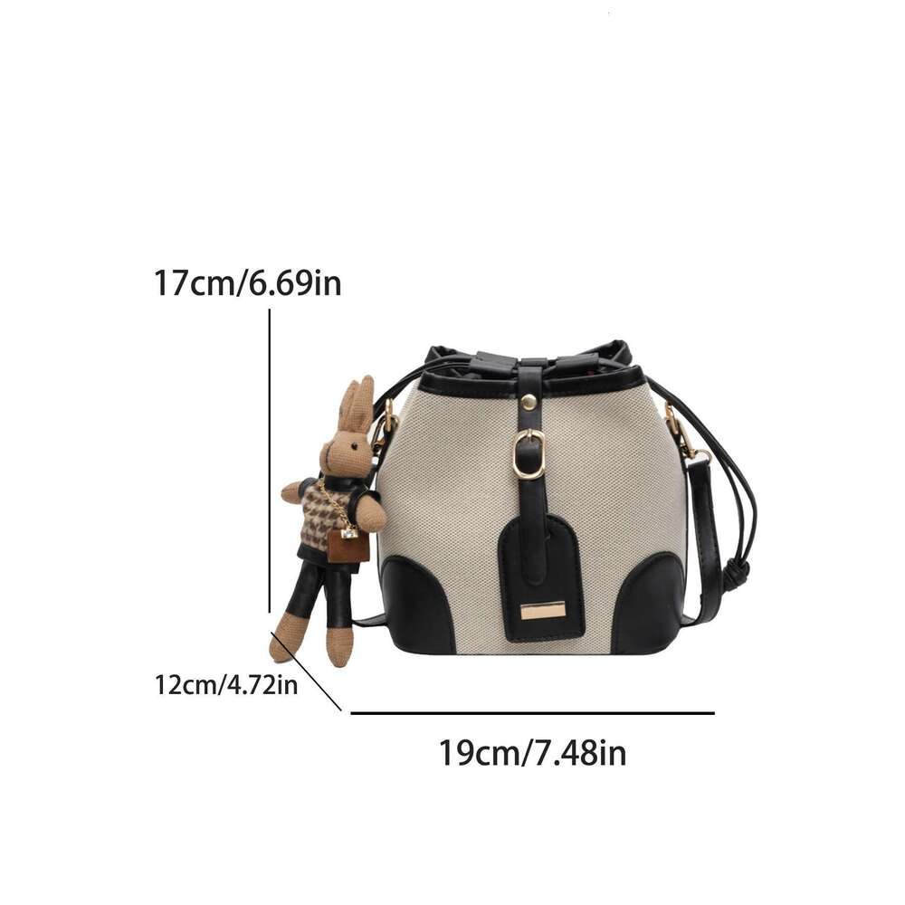 Splice bump color design hasp bucket fashion casual slant shoulder bag (with little rabbit pendant)