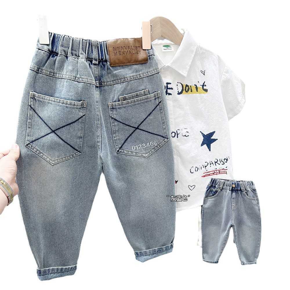Boys Pants 2025 New Mid Size Childrens Spring and Autumn New Loose Jeans Boys Baby Childrens Personalized Jeans Y250430T3V5