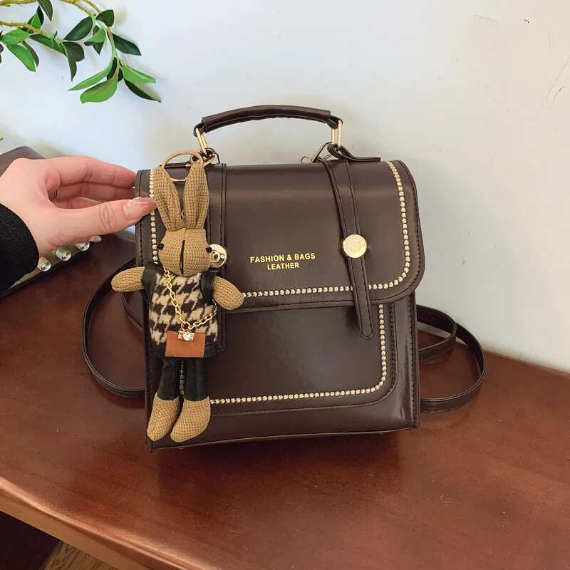 2025 New British Style Bag Versatile Women's Handheld Korean Edition Retro Outward Travel Backpack