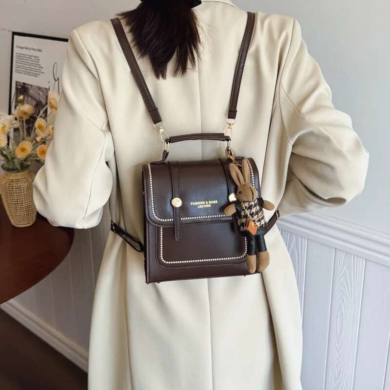 2025 New British Style Bag Versatile Women's Handheld Korean Edition Retro Outward Travel Backpack