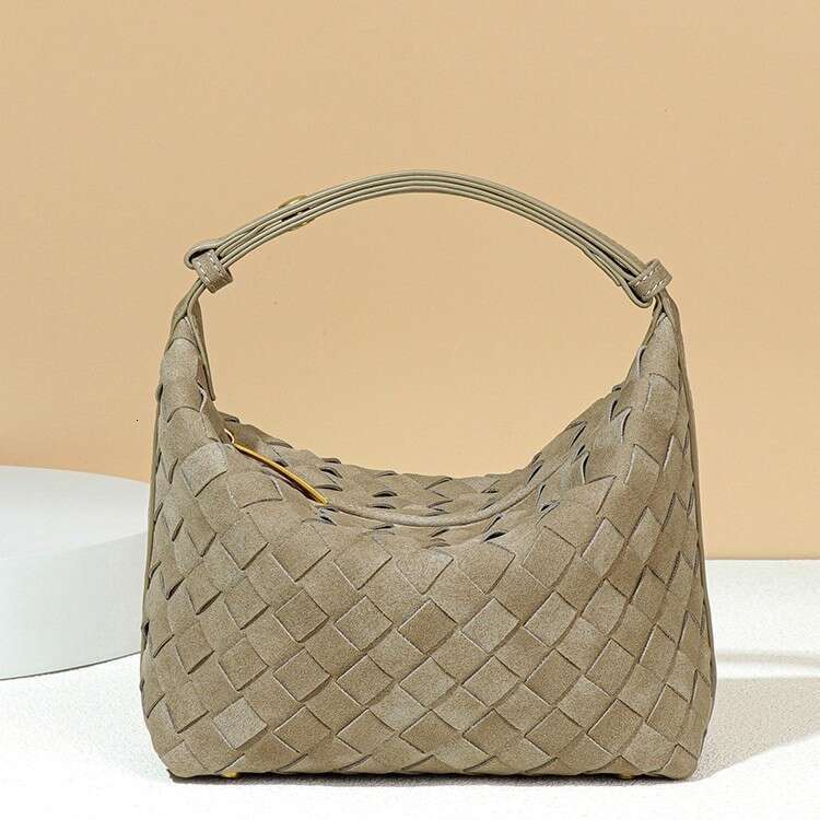 Texture soft leather hand woven personalized versatile, hand-held lunch box bag, high-end and casual single shoulder underarm women's bag