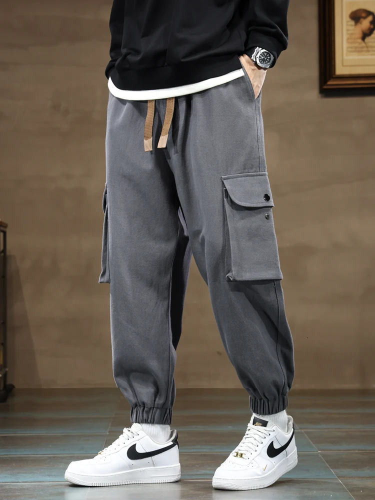 Large mens jogging cargo pants 8XL 7XL 6XL street clothing washing cotton casual bag pants solid color loose mens Trousers 250428