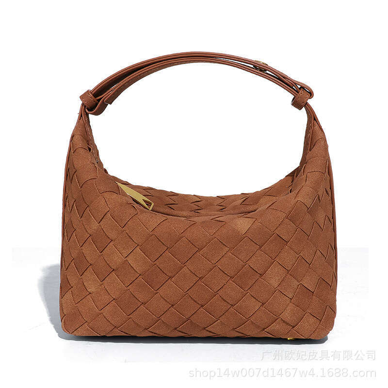 Texture soft leather hand woven personalized versatile, hand-held lunch box bag, high-end and casual single shoulder underarm women's bag