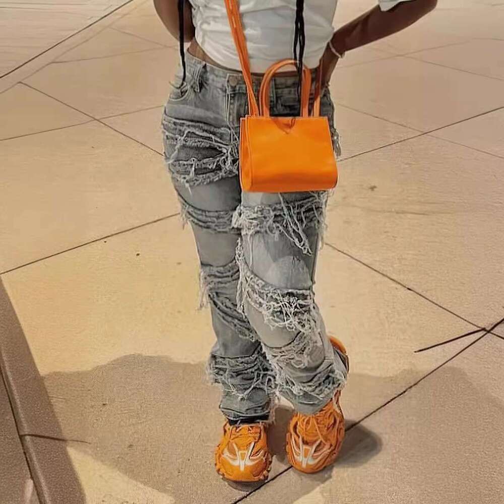 S69562025 summer denim layered perforated washed straight tube tassel fashionable jeans 2025 new casual fashion trend clothing