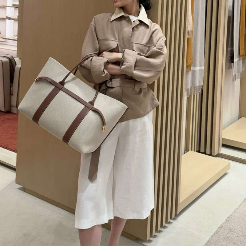 Canvas tote bag women 2025 new style, high-end, large capacity, versatile for commuting, niche design, contrasting color handbag