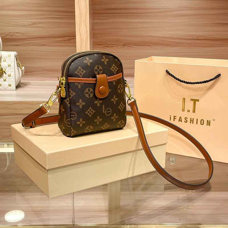 Mobile phone bag women's new type of old flower delicate senior sense mini women shoulder sling bag 2025