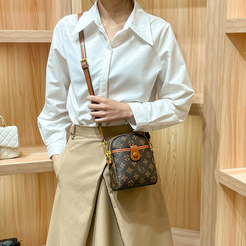 Mobile phone bag women's new type of old flower delicate senior sense mini women shoulder sling bag 2025