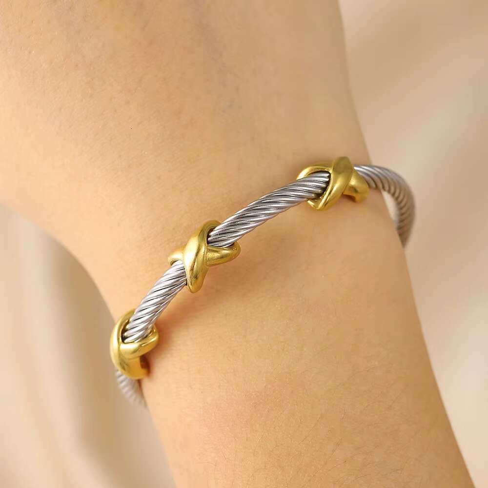 DHCollections 8MM Stainless Steel Cable Bracelet with Gold X Design Adjustable Bangle