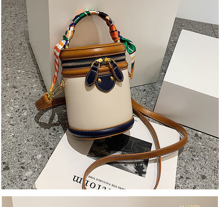 New hot selling niche designer designed cylindrical bag, retro and fashionable hand-held crossbody bucket bag, women's free shipping