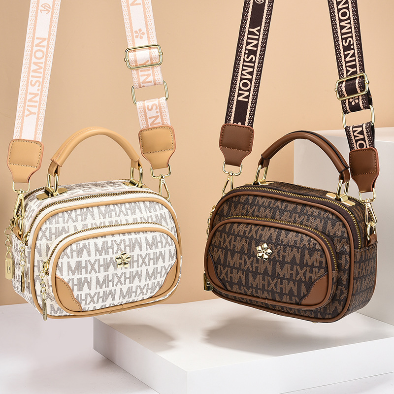 New fashionable women's bags with a niche and high-end feel, hand-held crossbody bags, versatile women's retro single-shoulder bags