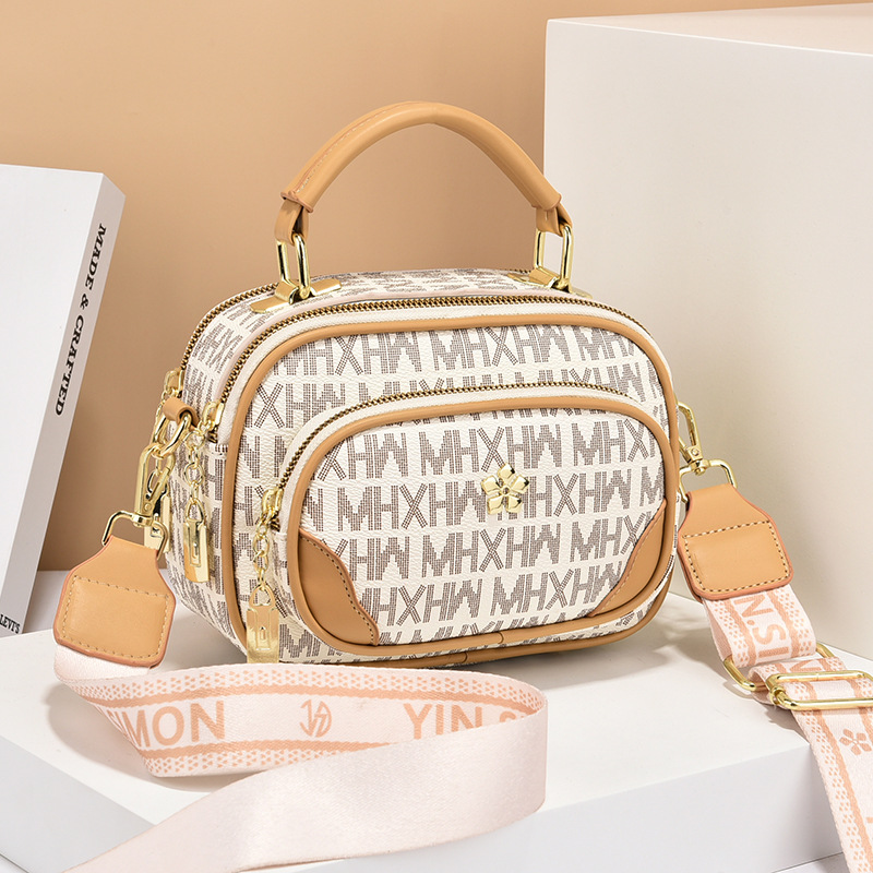New fashionable women's bags with a niche and high-end feel, hand-held crossbody bags, versatile women's retro single-shoulder bags