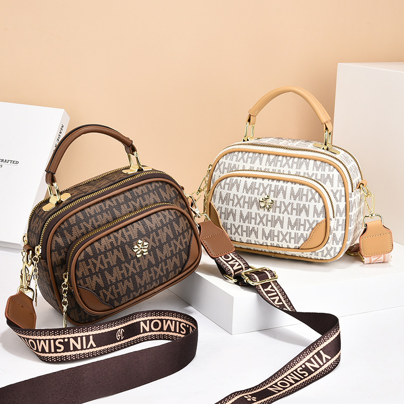 New fashionable women's bags with a niche and high-end feel, hand-held crossbody bags, versatile women's retro single-shoulder bags