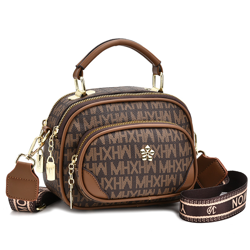 New fashionable women's bags with a niche and high-end feel, hand-held crossbody bags, versatile women's retro single-shoulder bags
