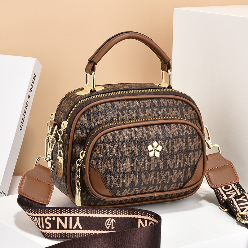New fashionable women's bags with a niche and high-end feel, hand-held crossbody bags, versatile women's retro single-shoulder bags