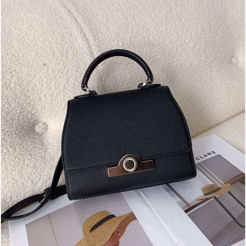 Celebrity style handbag with top layer cowhide round buckle flip cover commuter mailman bag, letter package, small square bag