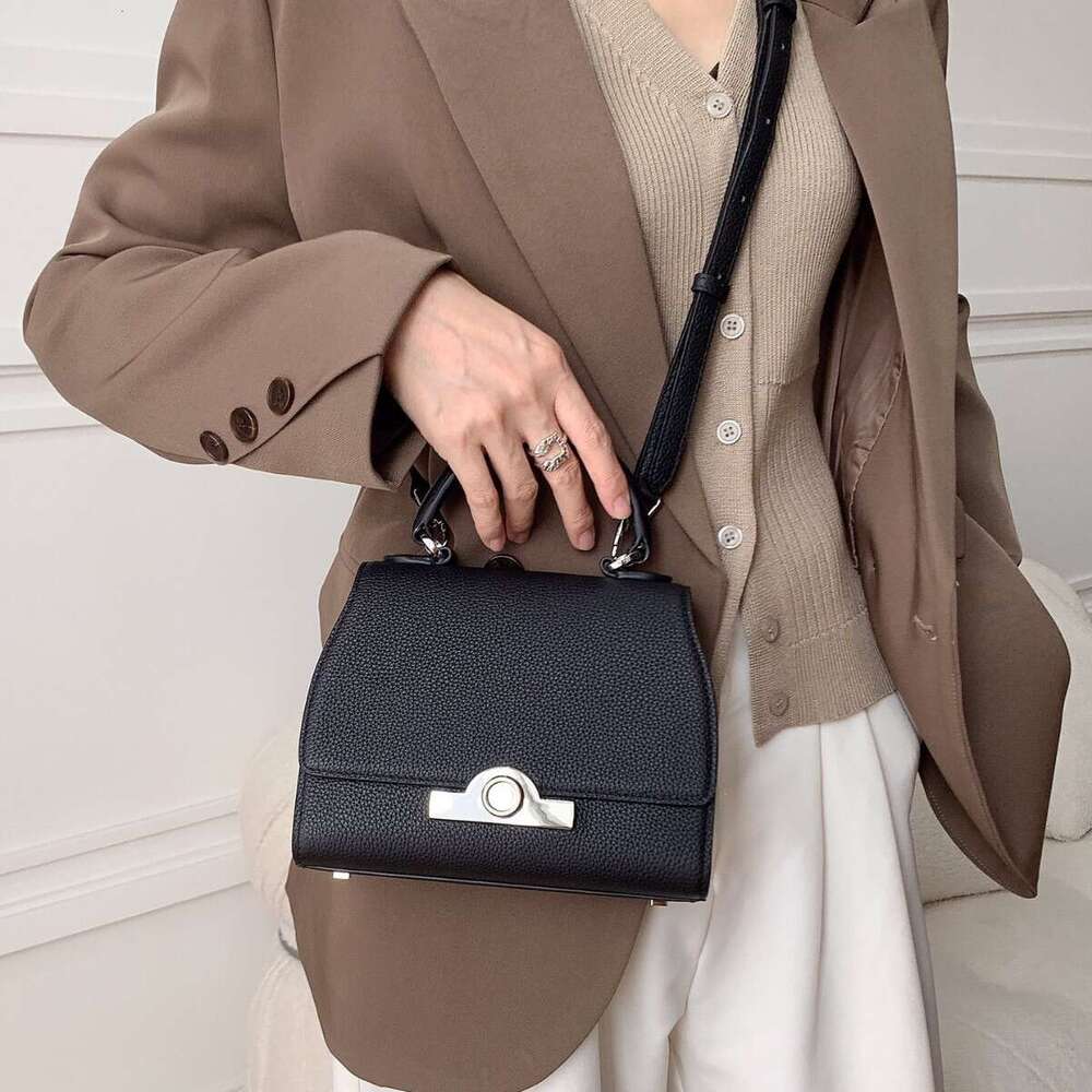 Celebrity style handbag with top layer cowhide round buckle flip cover commuter mailman bag, letter package, small square bag