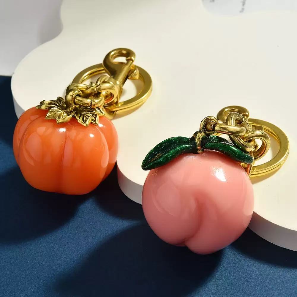 Designer bag charm Small Pumpkin Peach Bag charm Keychain Small Taxi Pear and Mushroom Keyring Hangings key chain women Lanyards Keychains Wallet R250526