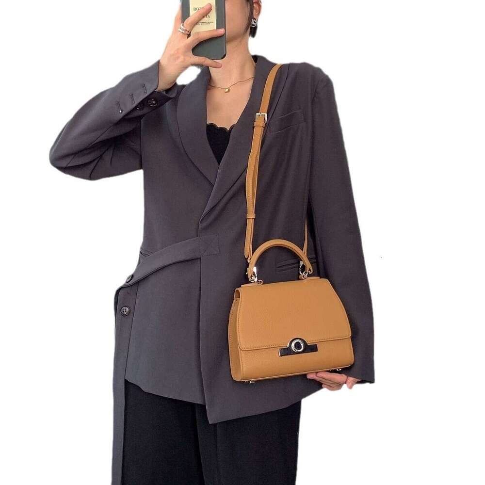 Celebrity style handbag with top layer cowhide round buckle flip cover commuter mailman bag, letter package, small square bag