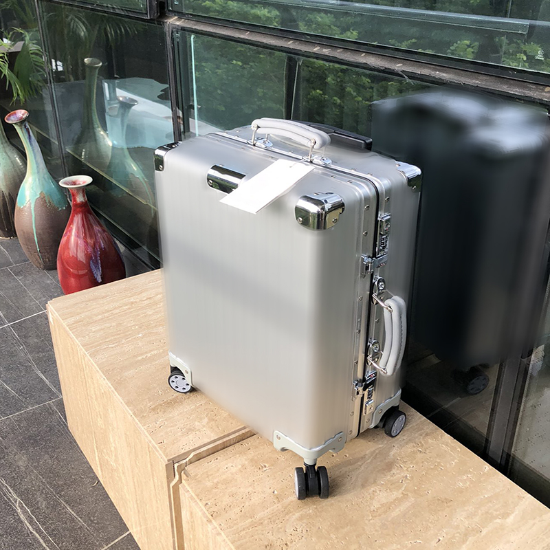 Luggage Rim0 Classic series, metal universal wheel large capacity trolley case, silver/black fashion luxury boarding box .