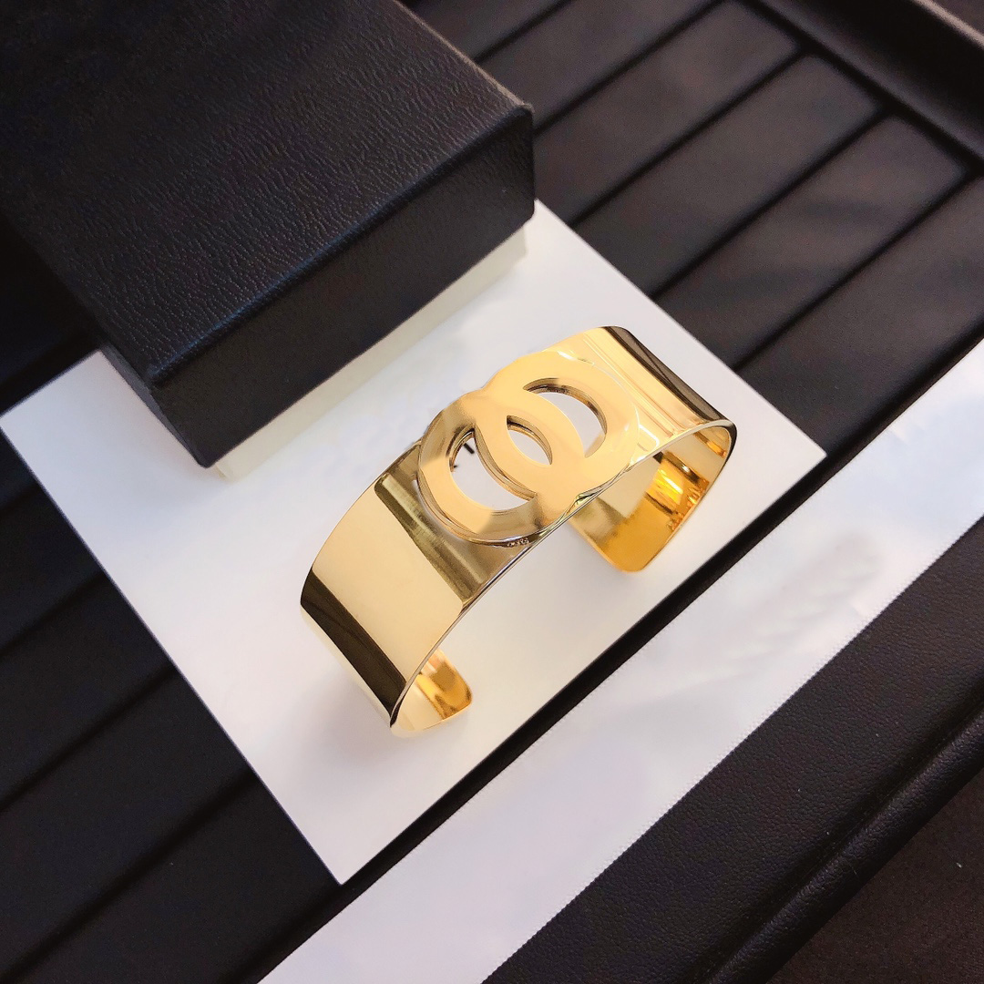 Modern Gold Tone Openwork Cuff Bracelet with Logo Accent Fashionable Jewelry for Women Stylish Gift for Special Occasions