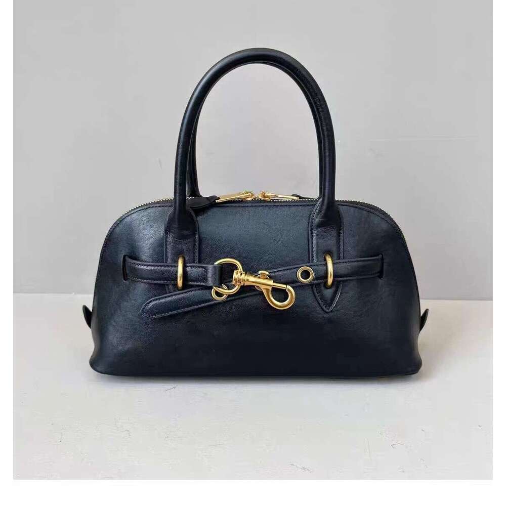 Miao Family's Autumn and Winter New Aventure Shell Baotou Layer Leather Handbag, High end Document Bag Trend
