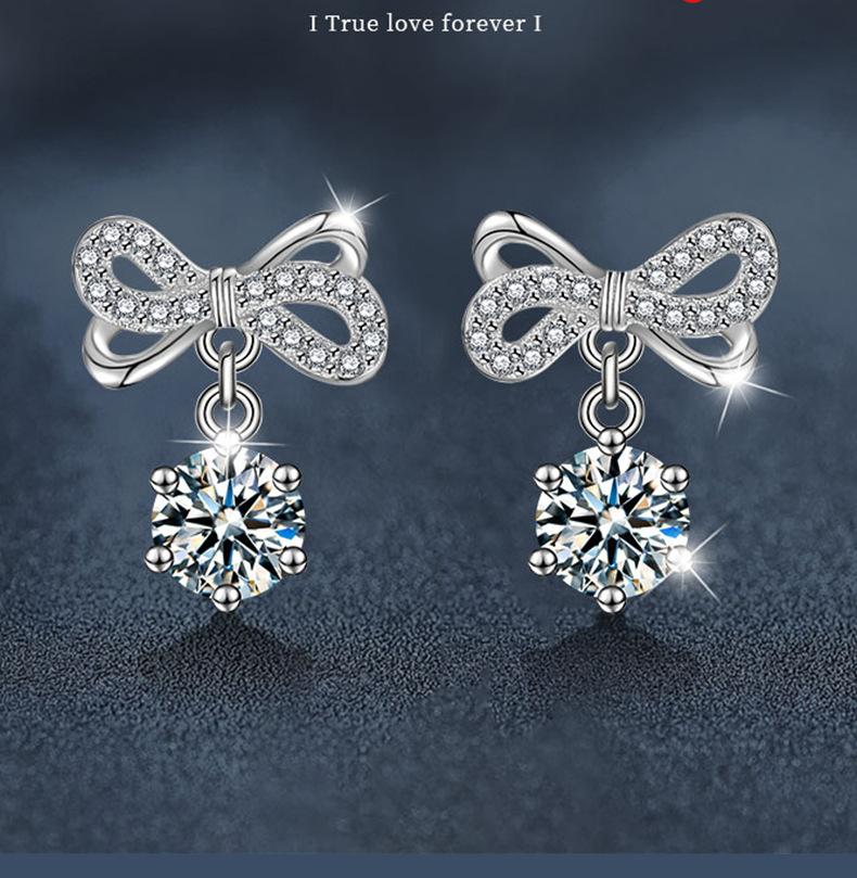 Sterling Silver Butterfly-Knot Moissanite Dangle Earrings.