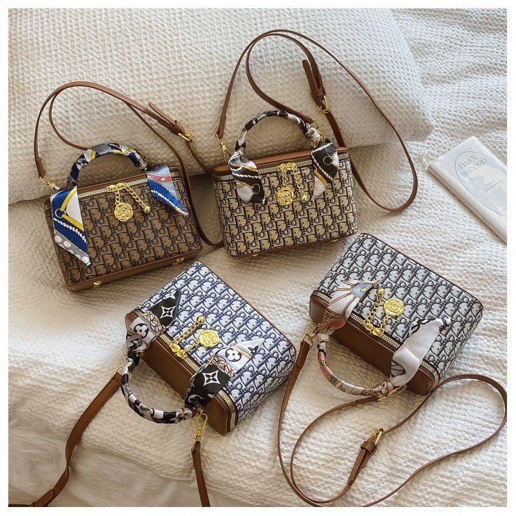 2025 Advanced Makeup Bag New Winter Collection Women's Portable Handheld Single - shoulder Bucket Bag Cross - body Canvas Embroidered Box Bag new
