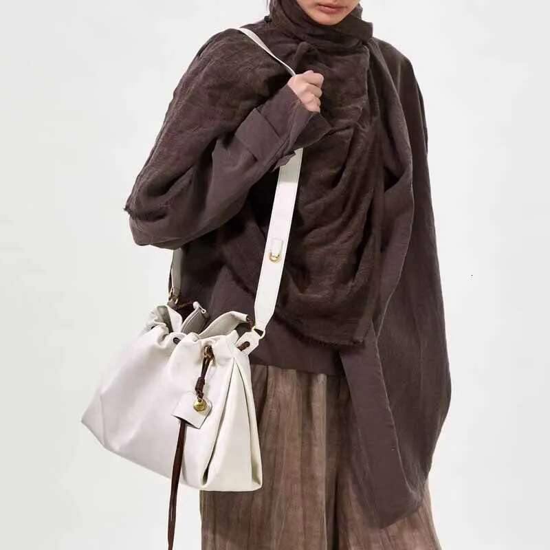 Designer bag 57 2025 New High-Capacity Commute Handbag Brand Design Garbage Genuine Leather Women Hobo Fashion Shoulder Bag