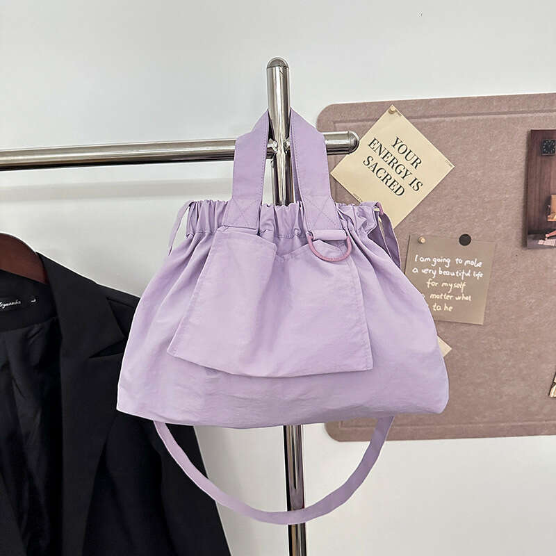 Singapore's new dumpling foldable portable soft nylon handbag for men and women, large capacity crossbody bag