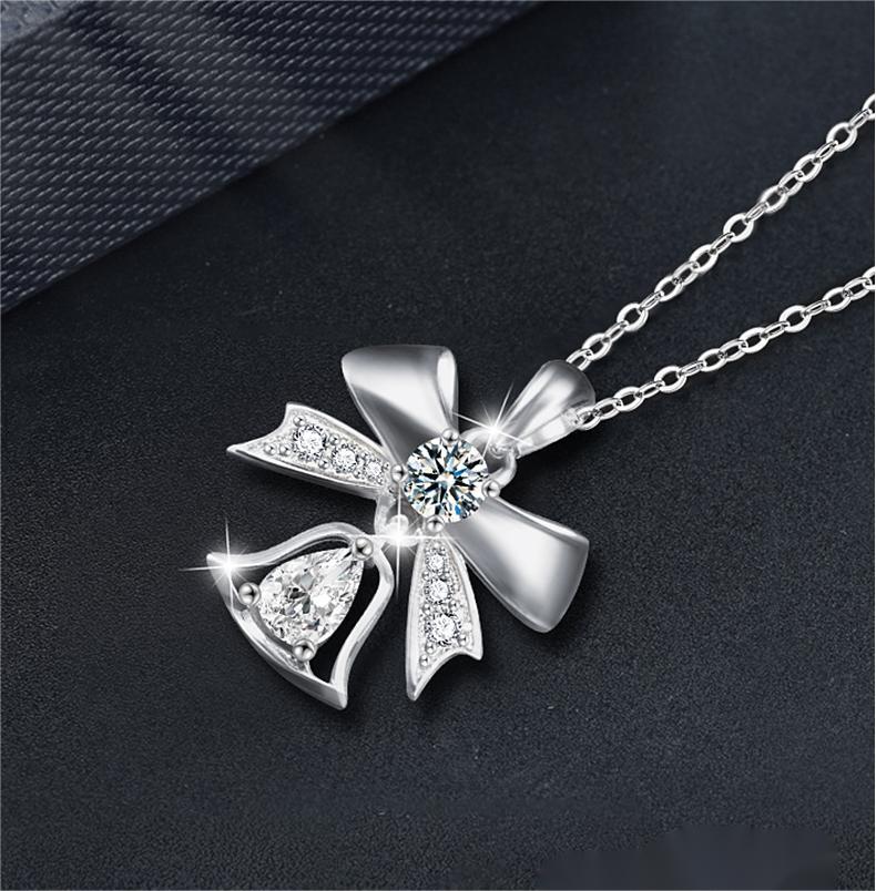 Elegant Bow and Bell Pendant Necklace in S925 Silver with Moissanite - Festive Holiday Charm Jewelry Gift for Women