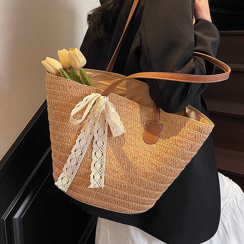 French style artistic beach grass woven shoulder bag for women with a sense of luxury, large capacity for versatile commuting, vegetable basket tote b