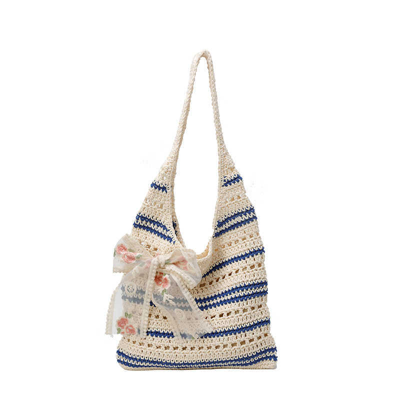 Trendy new hollow woven small fresh artistic style tote bag, niche and lazy, sweet and casual single shoulder women's bag