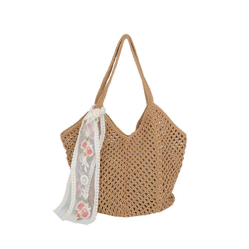This year's spring and summer artistic style, small and fresh hollow woven tote bag, casual vacation style, large capacity shoulder bag