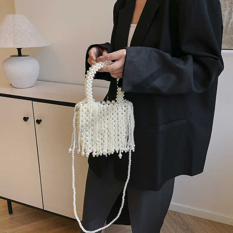Tassel woven small bag for women 2025 new fashionable versatile handbag, dinner bag, chain bar crossbody bag, accessory bag