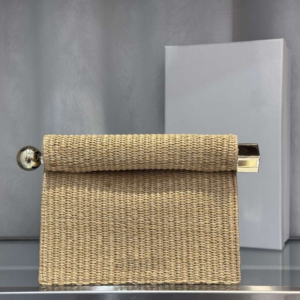 2025 New Summer Straw Sheepskin Vacation Style Handheld Chain Shoulder Crossbody Metal Curled Edge Folding Sculpture Bag