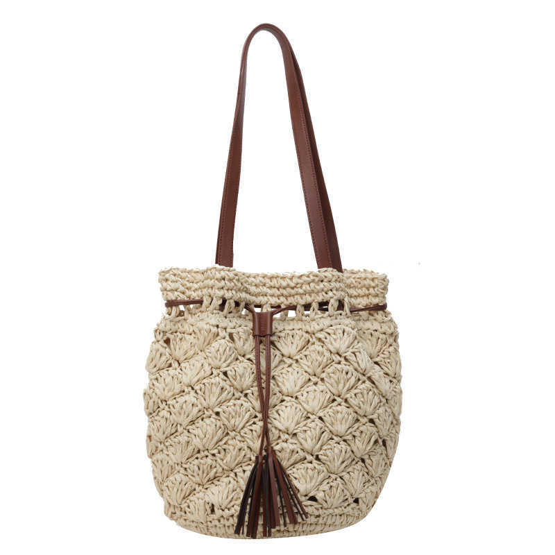 Spring and summer popular casual fashion vacation style beach bag niche design small fresh one shoulder grass woven bag for women