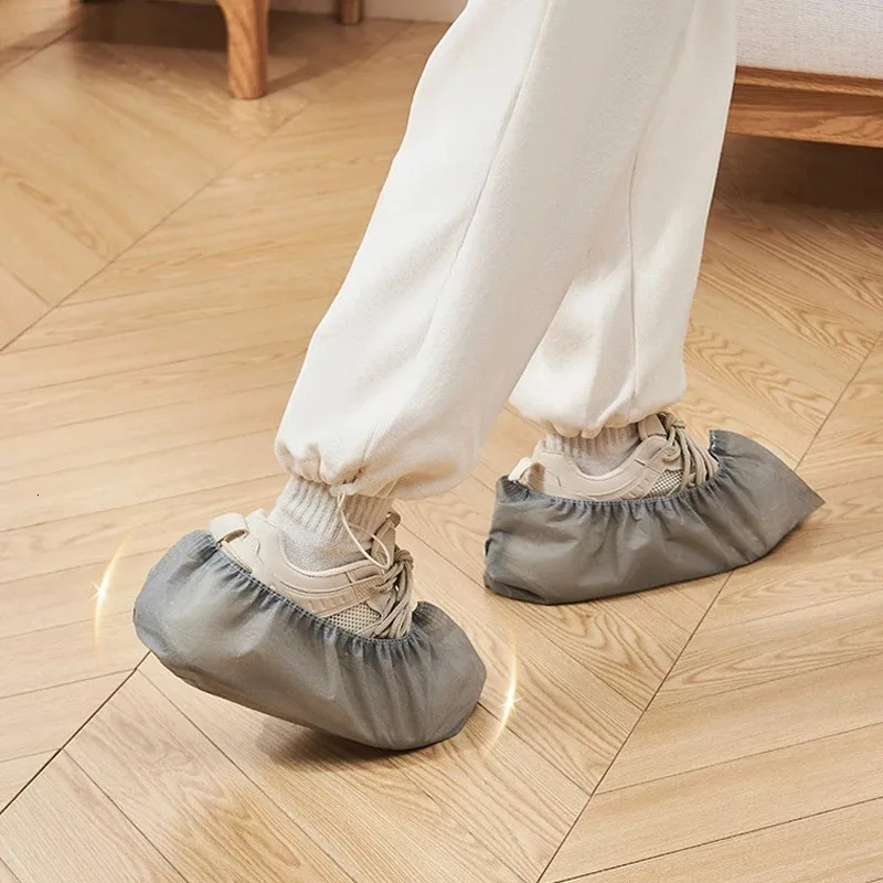 100 count disposable boot shoe covers with anti slip and elastic properties are used for indoor carpet floor protection in the workplace 250428s