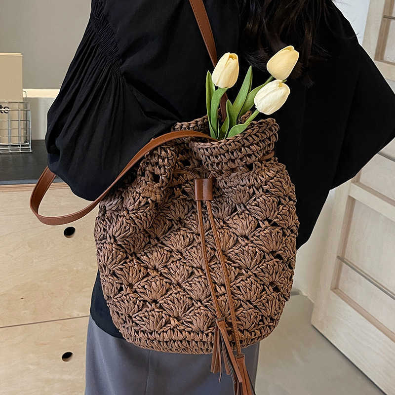 Spring and summer popular casual fashion vacation style beach bag niche design small fresh one shoulder grass woven bag for women