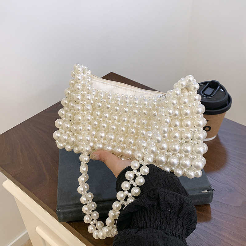 Small niche design, fashionable, simple and versatile women's shoulder bag, 2025 new cute and elegant casual handbag, white