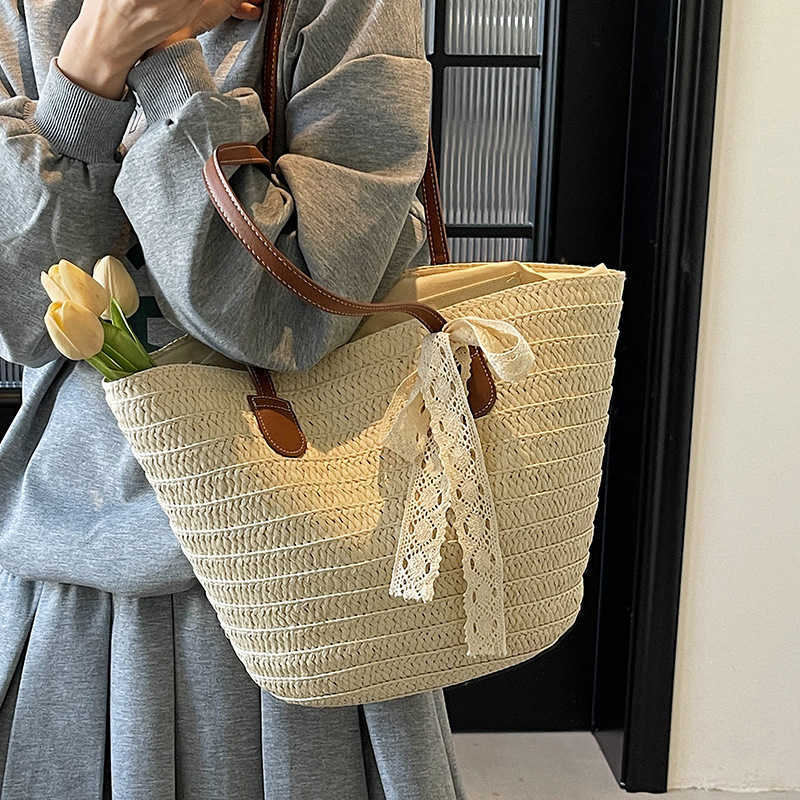 French style artistic beach grass woven shoulder bag for women with a sense of luxury, large capacity for versatile commuting, vegetable basket tote b