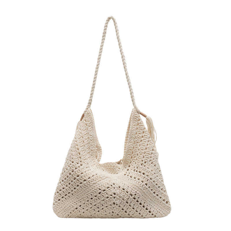 Forest style new artistic hollow woven bag for women, casual bohemian style, lightweight and fashionable, large capacity shoulder bag